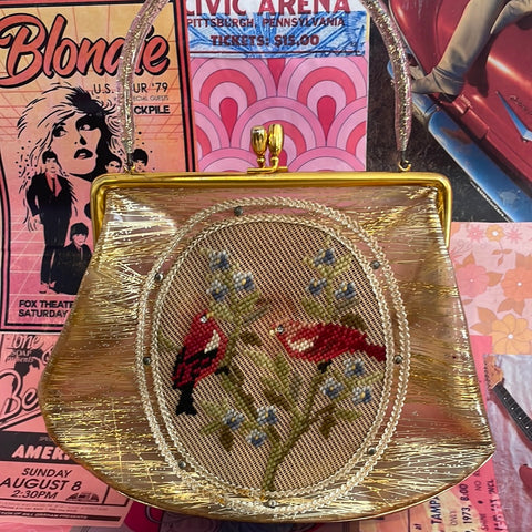 Gold bird stitched purse