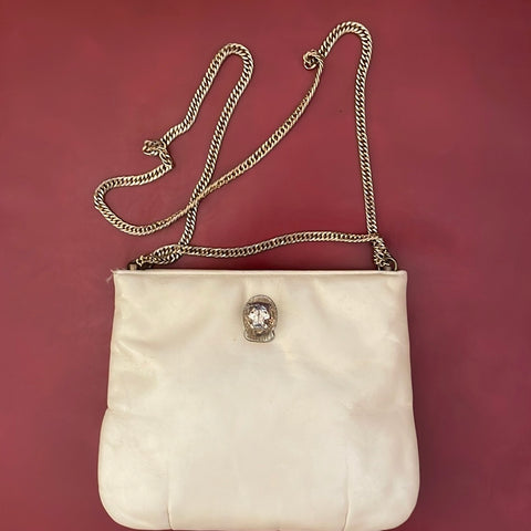 cream leather bag with lion head